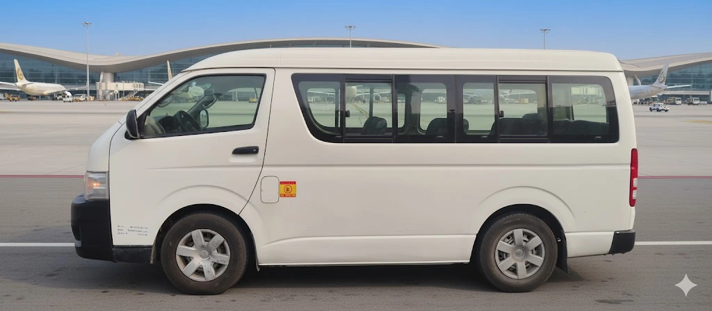 Toyota Coaster minibus side view in Dubai